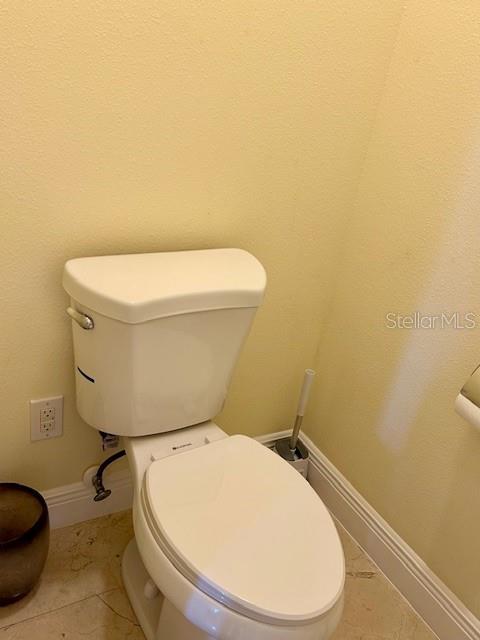 17127 Brown Road Odessa, FL 33556 - Photo 51 of 58 a white toilet sitting next to a white sink