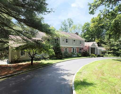118 Pembroke Road Darien, CT 06820 - Photo 1 of 18 a front view of a house with a yard