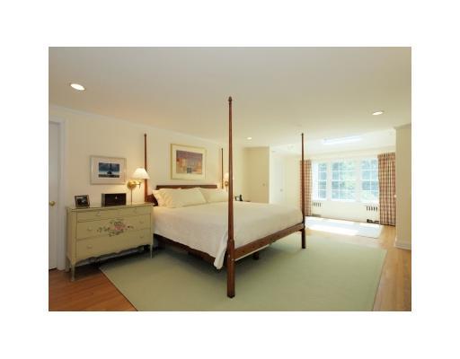 118 Pembroke Road Darien, CT 06820 - Photo 11 of 18 a en suite bathroom with a tub sink and view living room