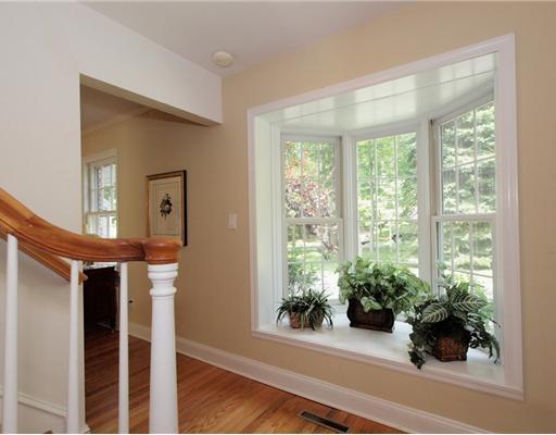 118 Pembroke Road Darien, CT 06820 - Photo 15 of 18 a view of entryway with wooden floor and front door