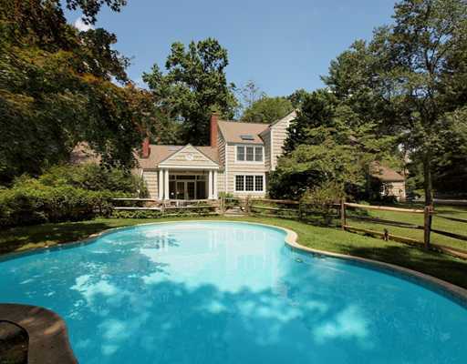118 Pembroke Road Darien, CT 06820 - Photo 18 of 18 a front view of a house with swimming pool