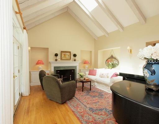 118 Pembroke Road Darien, CT 06820 - Photo 4 of 18 a living room with furniture and a fireplace