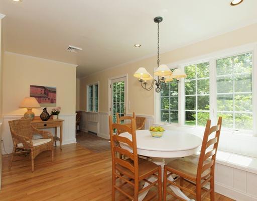 118 Pembroke Road Darien, CT 06820 - Photo 7 of 18 a view of a dining room with furniture window and wooden floor