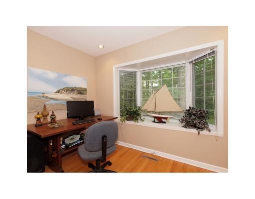 118 Pembroke Road Darien, CT 06820 - Photo 10 of 18 a living room with furniture and a flat screen tv