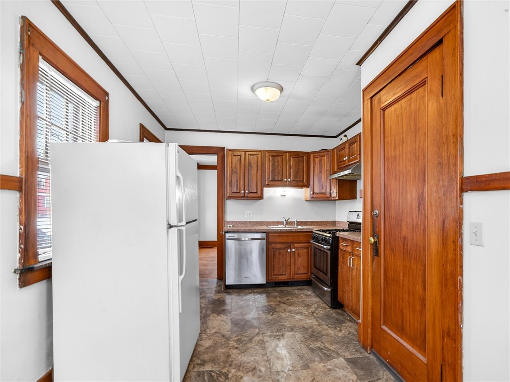 79 Arvine Heights Rochester, NY 14611 - Photo 22 of 34 Lower Kitchen- EAT IN