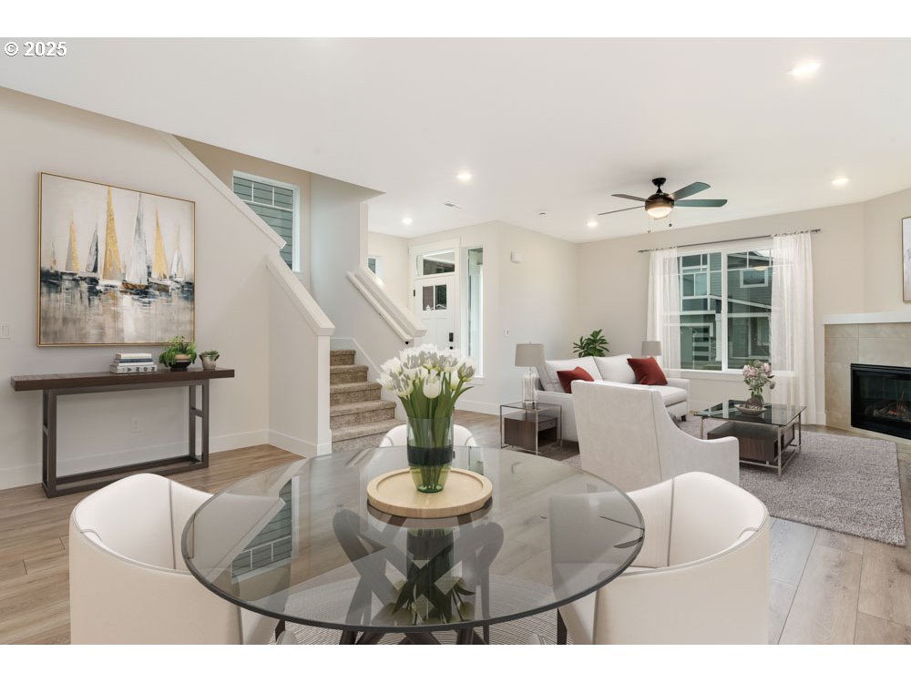 2475 North Villa Road Newberg, OR 97132 - Photo 3 of 9 a living room with fireplace furniture and a table