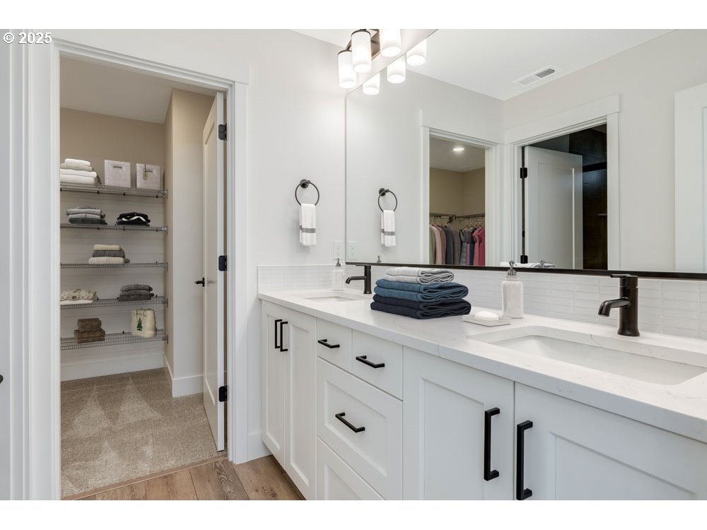 2475 North Villa Road Newberg, OR 97132 - Photo 6 of 9 a bathroom with a sink double vanity and a mirror