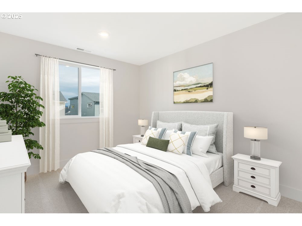 2475 North Villa Road Newberg, OR 97132 - Photo 8 of 9 a bedroom with a bed and a painting on the wall