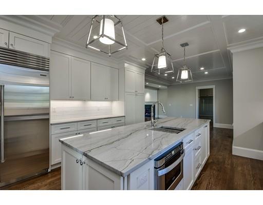 20 Mellon Road Wellesley, MA 02482 - Photo 12 of 25 a kitchen with a sink and chandelier