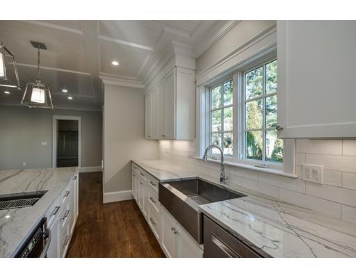20 Mellon Road Wellesley, MA 02482 - Photo 13 of 25 a kitchen with a sink stove and cabinets