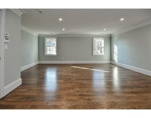 20 Mellon Road Wellesley, MA 02482 - Photo 15 of 25 an empty room with wooden floor and windows