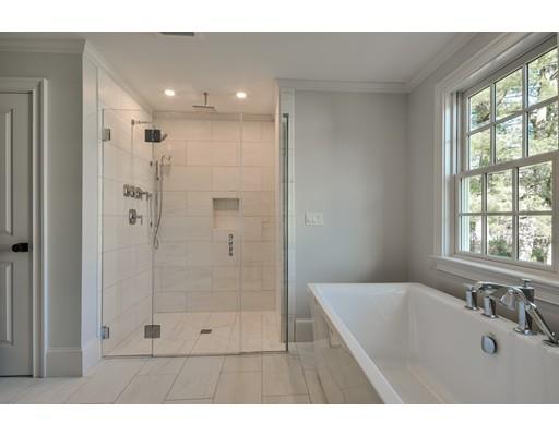 20 Mellon Road Wellesley, MA 02482 - Photo 17 of 25 a bathroom with a tub shower and a sink
