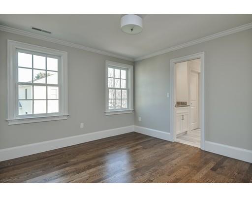 20 Mellon Road Wellesley, MA 02482 - Photo 18 of 25 an empty room with wooden floor and windows