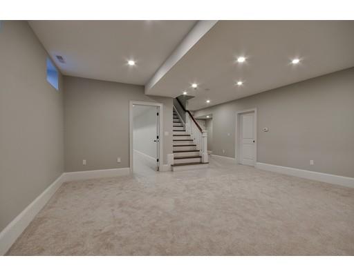 20 Mellon Road Wellesley, MA 02482 - Photo 21 of 25 a view of an empty room with stairs and a couch