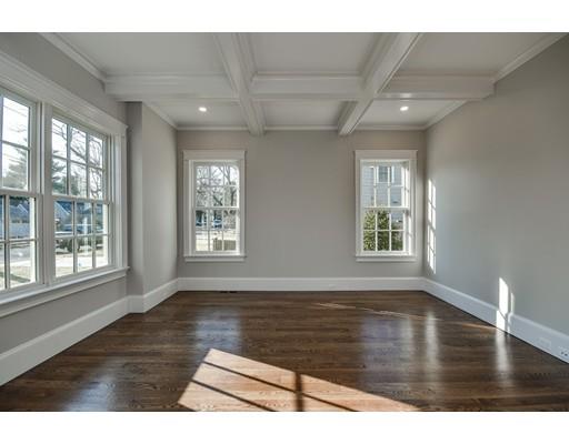 20 Mellon Road Wellesley, MA 02482 - Photo 4 of 25 a view of an empty room with wooden floor and a window