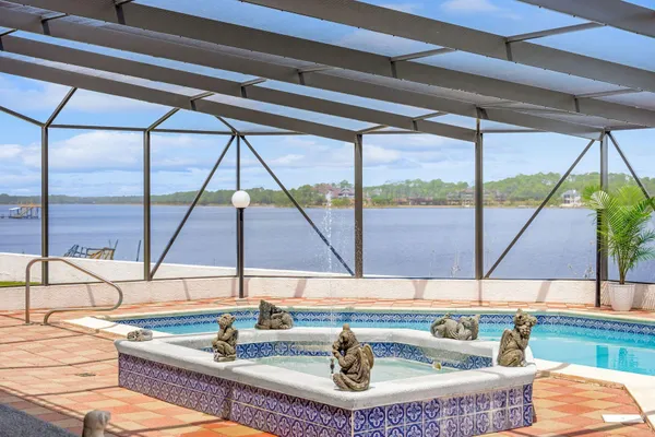 a living room with furniture a couch and wooden floor