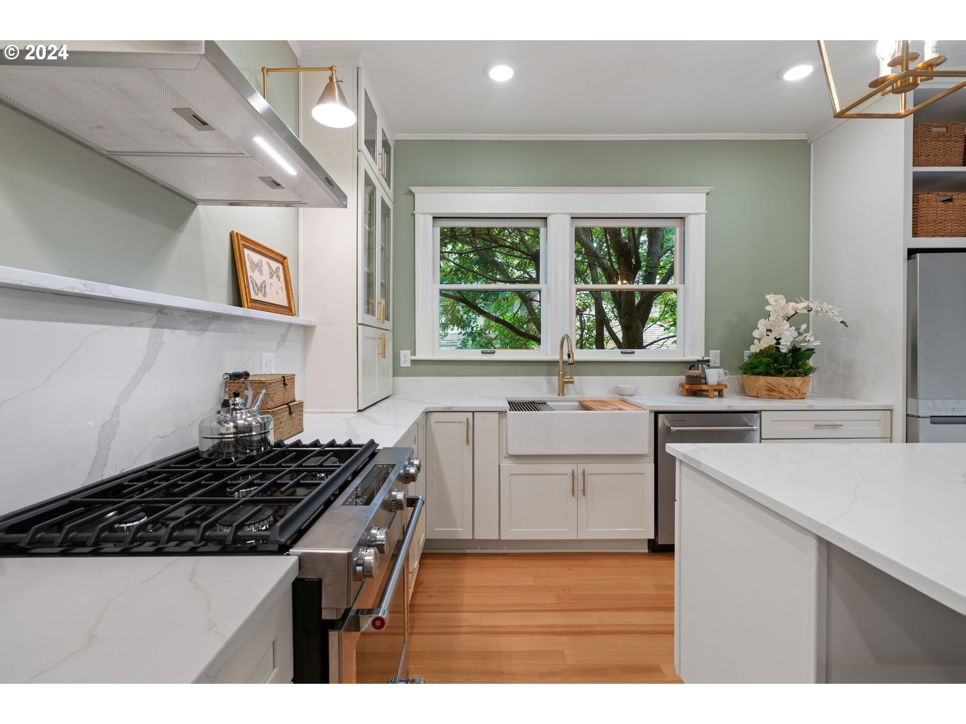 2548 Southwest St Helens Court Portland, OR 97201 - Photo 13 of 42 a kitchen with a stove and a sink