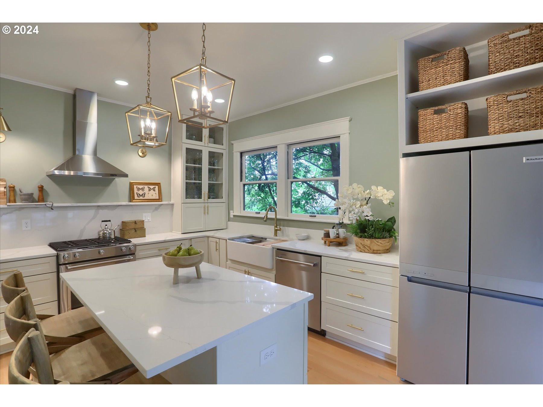 2548 Southwest St Helens Court Portland, OR 97201 - Photo 15 of 42 a kitchen with a sink a stove a refrigerator and cabinets