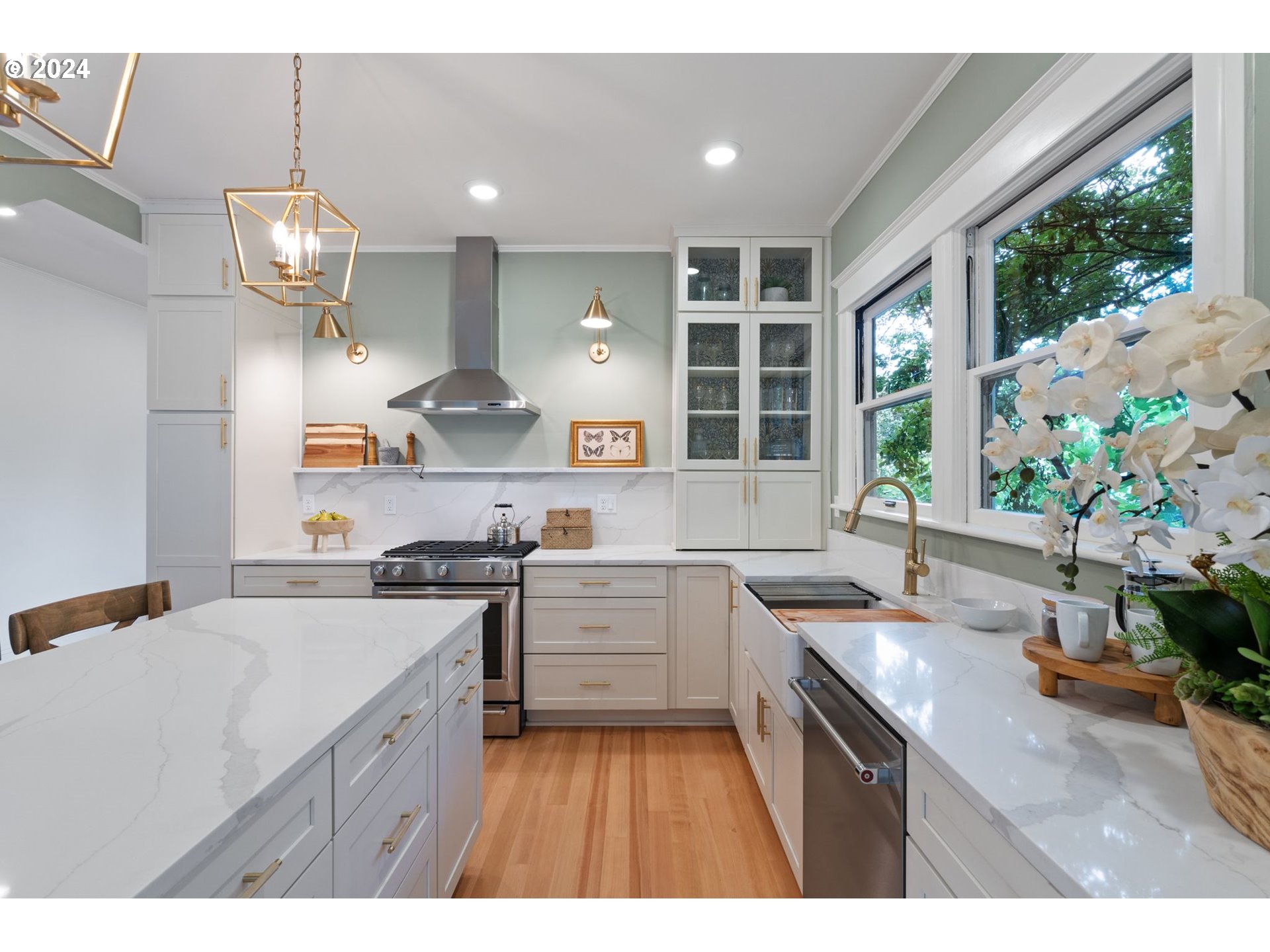 2548 Southwest St Helens Court Portland, OR 97201 - Photo 16 of 42 a kitchen with a sink stainless steel appliances and window