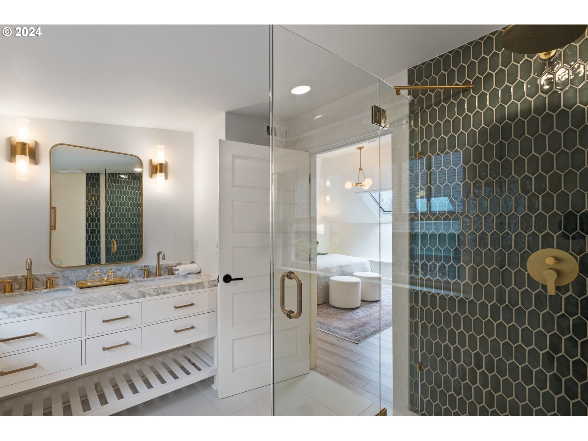 2548 Southwest St Helens Court Portland, OR 97201 - Photo 22 of 42 a bathroom with a shower a sink and a mirror