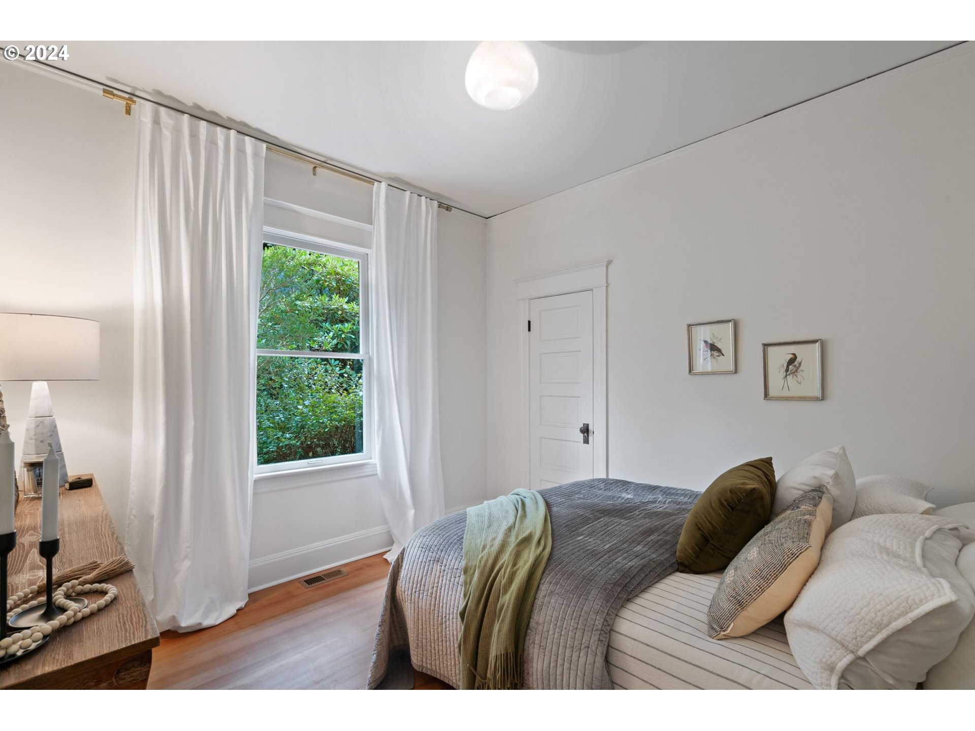 2548 Southwest St Helens Court Portland, OR 97201 - Photo 25 of 42 a living room with furniture and a window