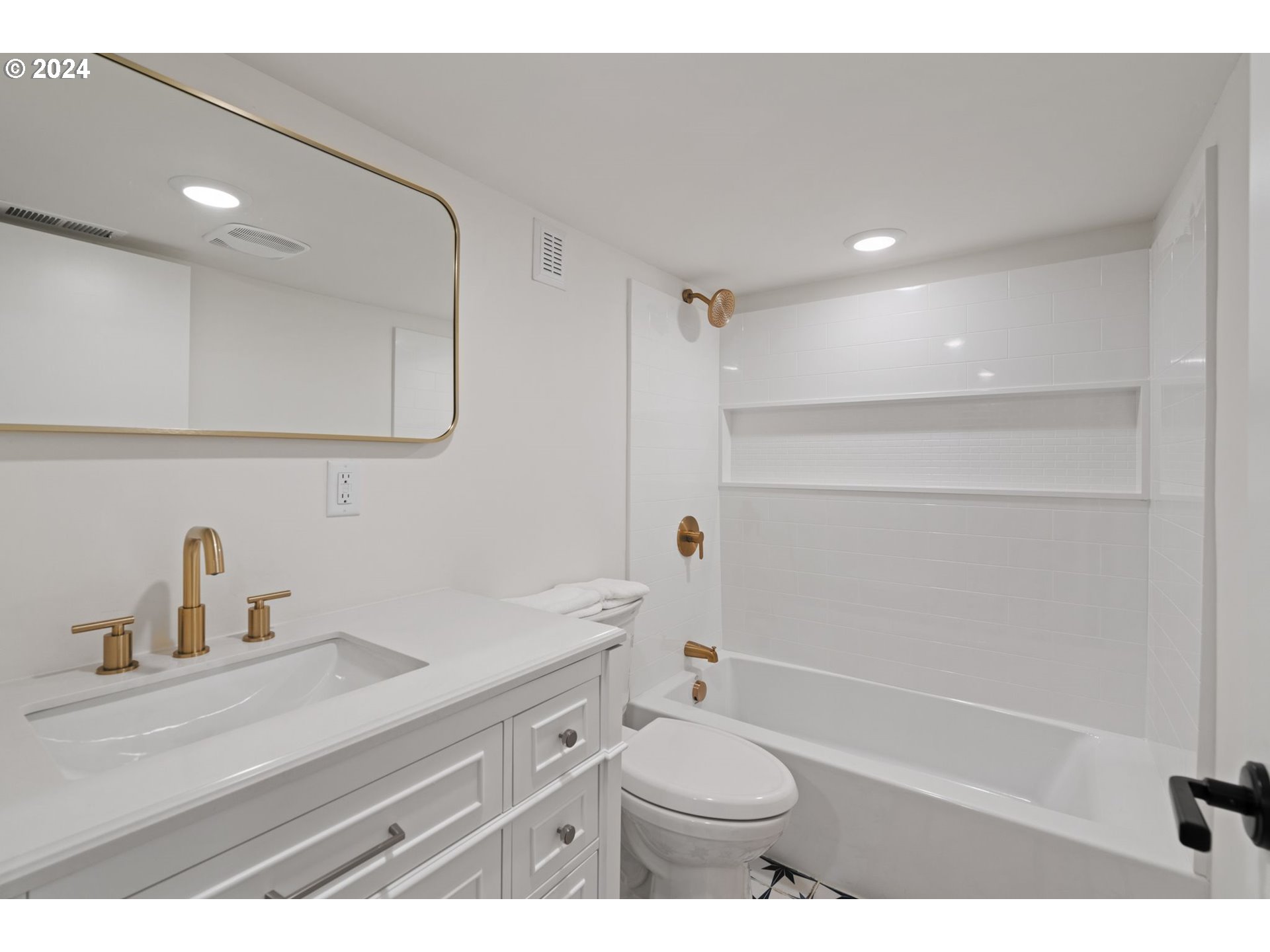 2548 Southwest St Helens Court Portland, OR 97201 - Photo 33 of 42 a bathroom with a sink a toilet and shower