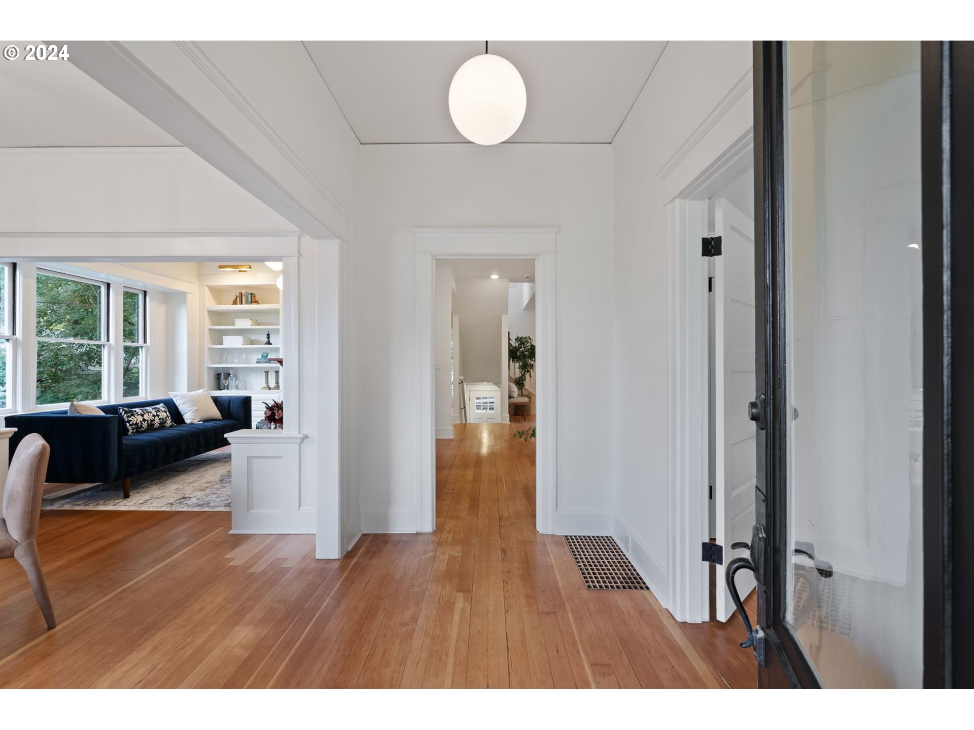 2548 Southwest St Helens Court Portland, OR 97201 - Photo 4 of 42 a living room with furniture and a wooden floor