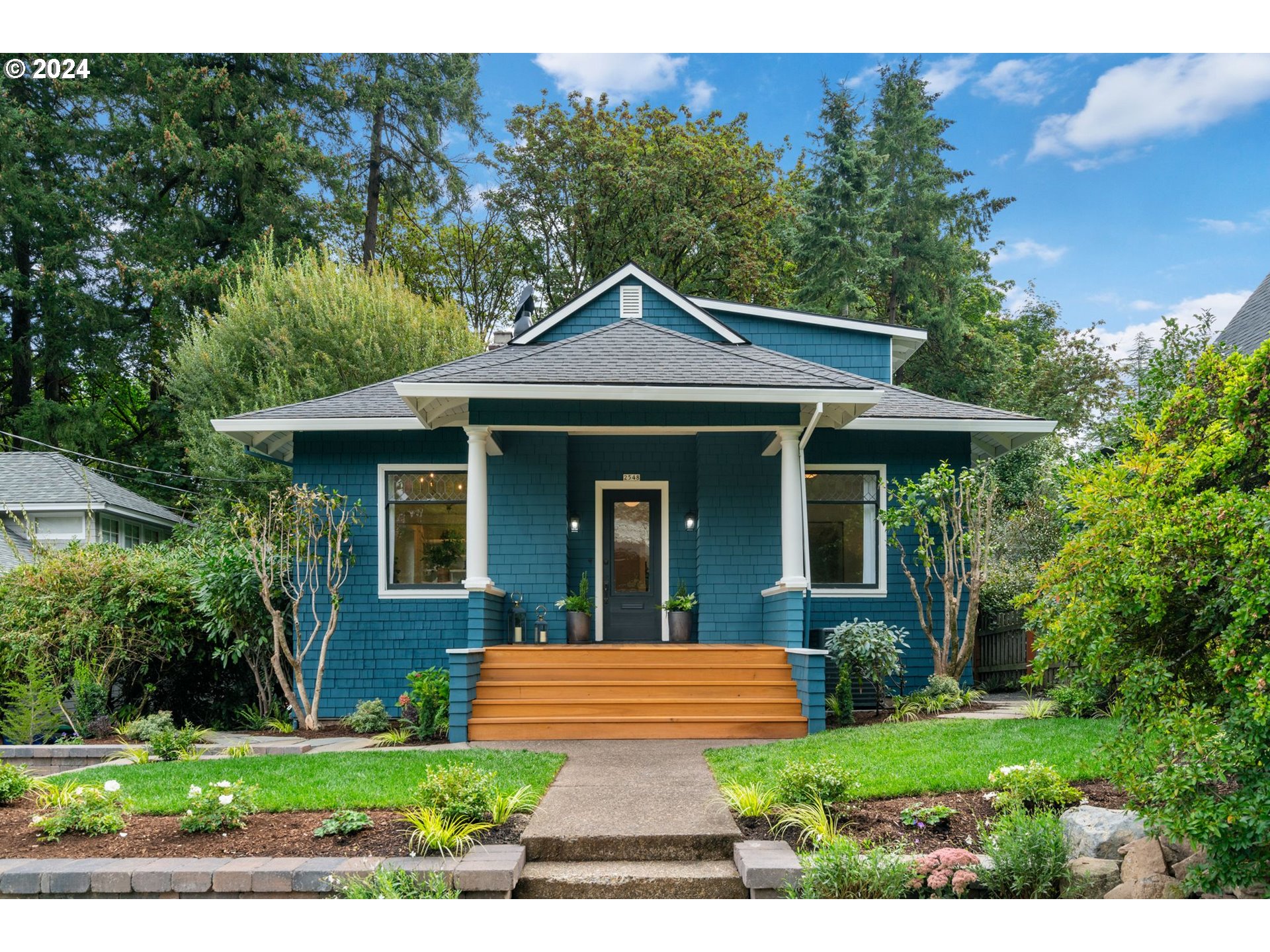 2548 Southwest St Helens Court Portland, OR 97201 - Photo 42 of 42 a front view of a house with a yard