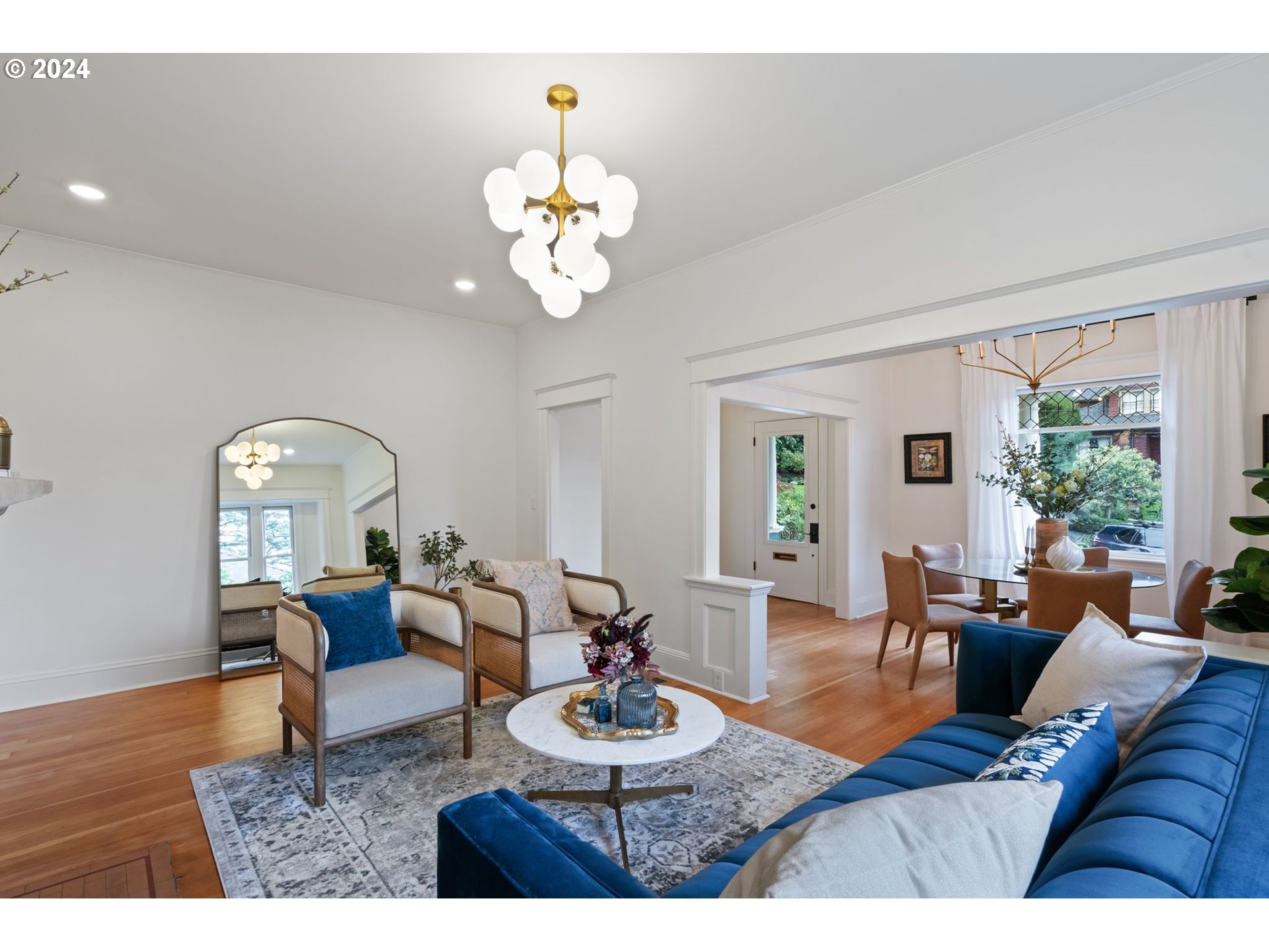 2548 Southwest St Helens Court Portland, OR 97201 - Photo 8 of 42 a living room with fireplace furniture and a wooden floor