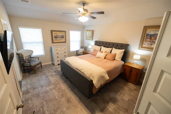 a bed room with a bed and a couch