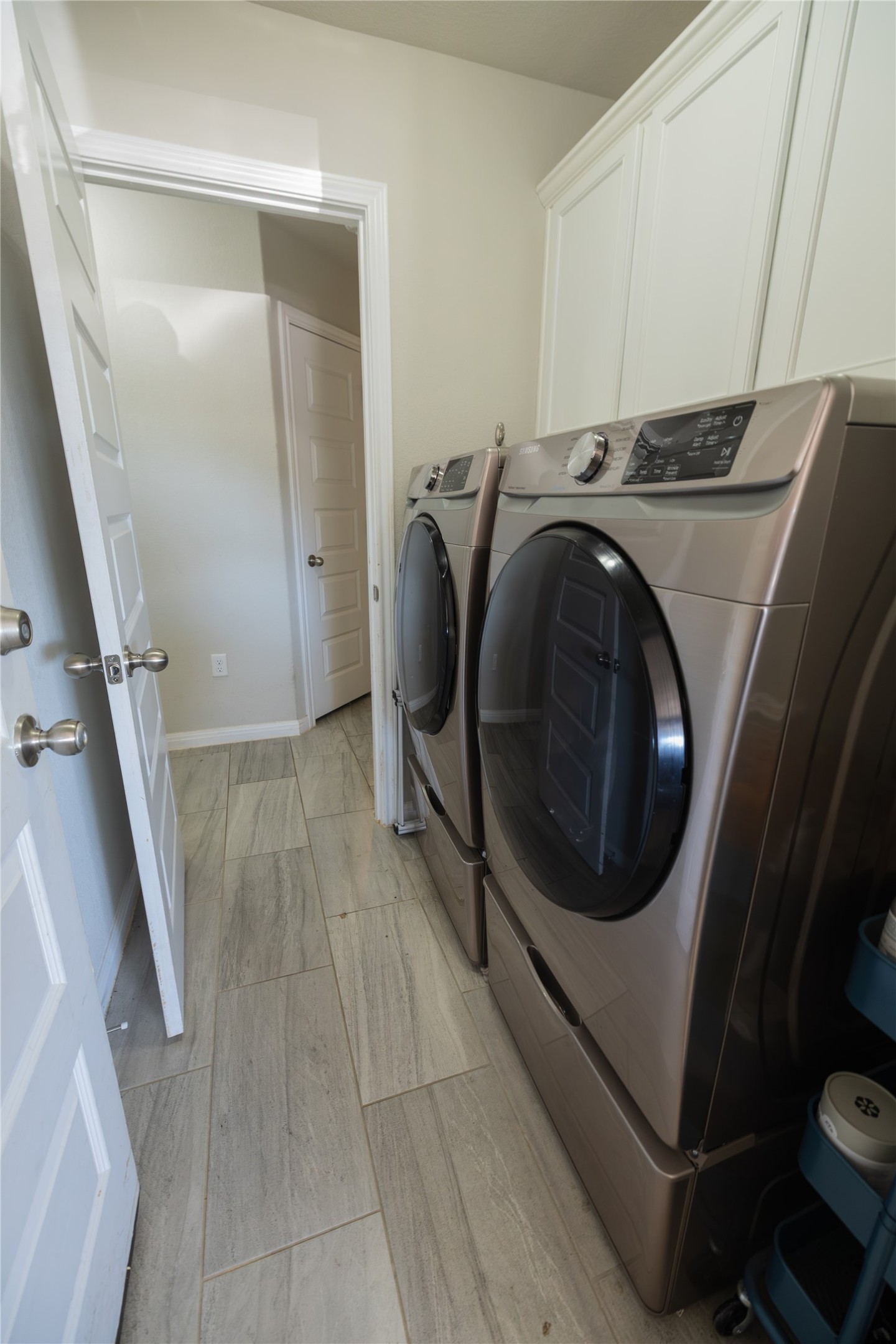 827 Savannah Cove Elgin, TX 78621 - Photo 18 of 31 Washroom featuring cabinet space