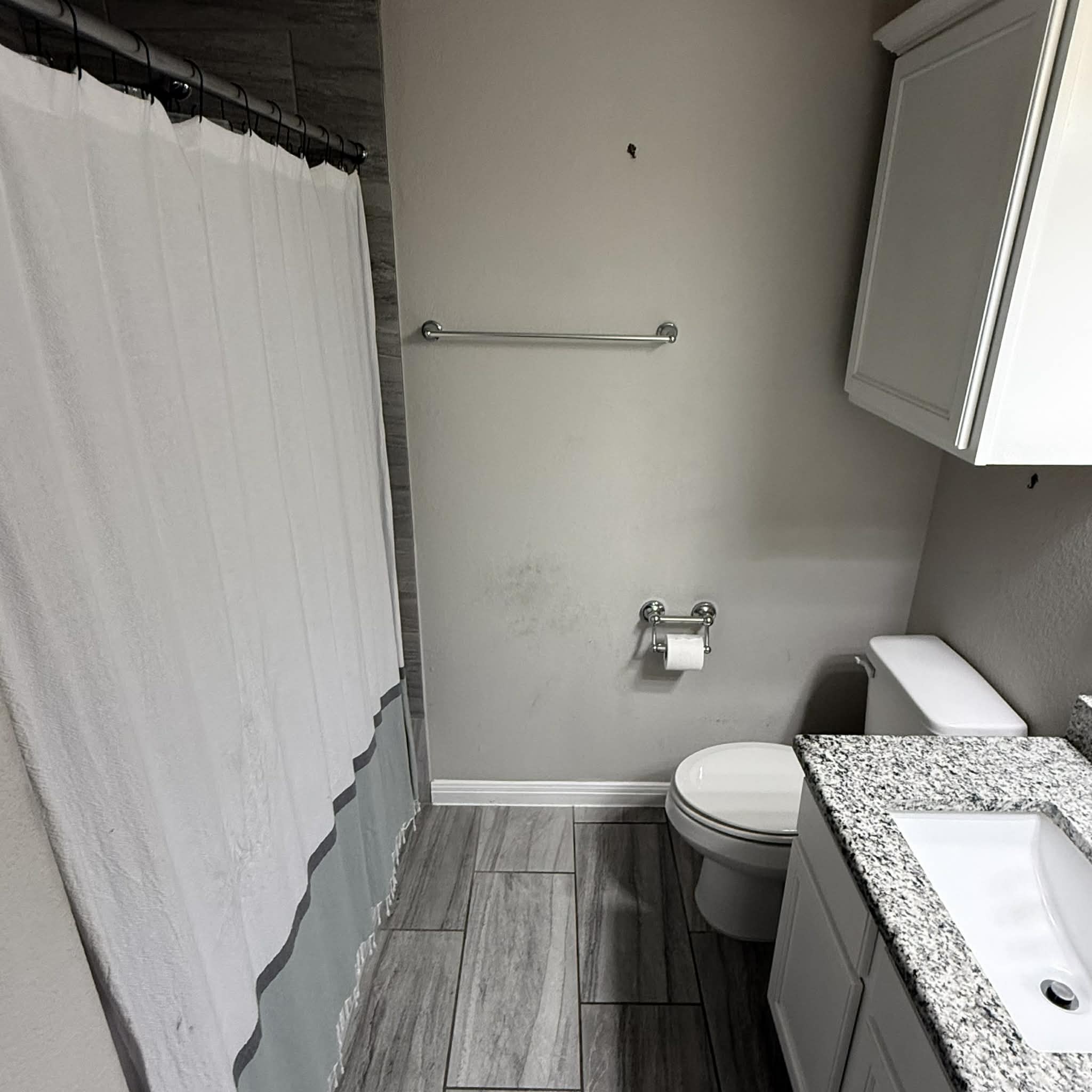 827 Savannah Cove Elgin, TX 78621 - Photo 23 of 31 Full main bathroom with vanity