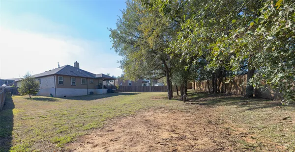 a view of backyard of house