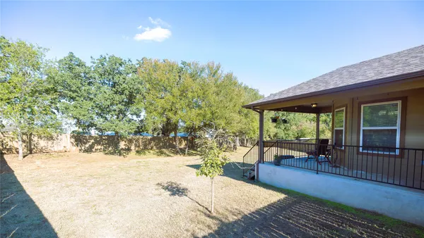 a view of balcony with furniture