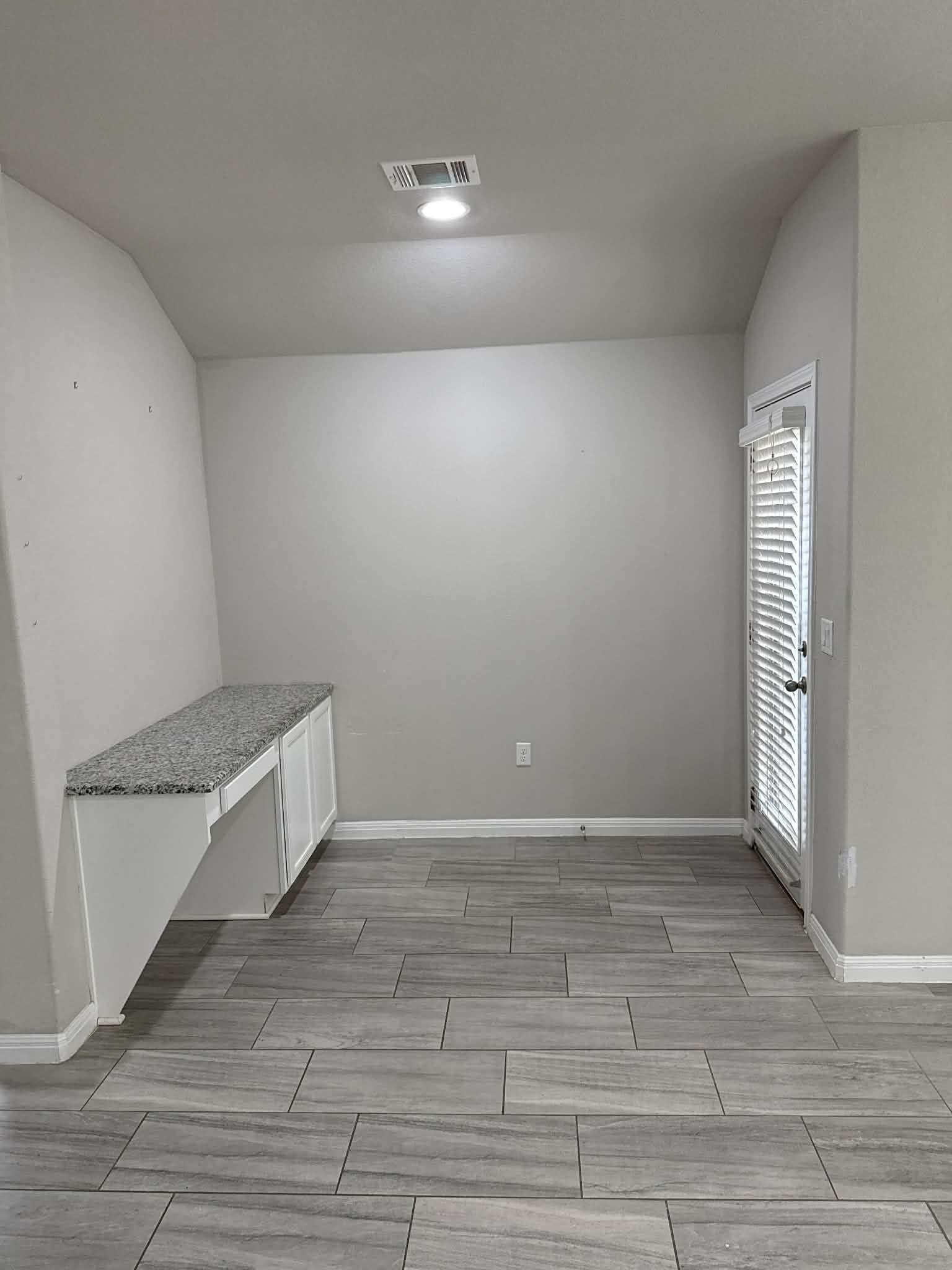 827 Savannah Cove Elgin, TX 78621 - Photo 8 of 31 Built in desk in the kitchen area near backdoor