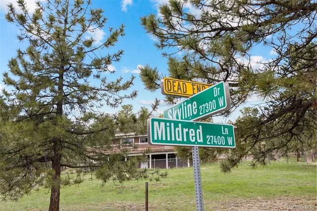 a sign that is on the side of a road