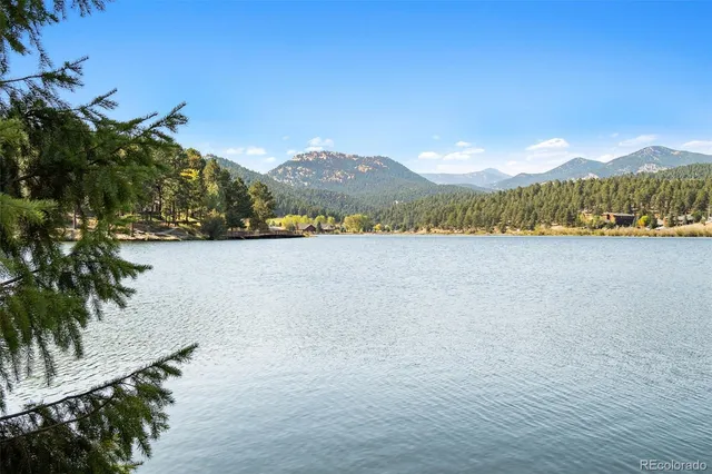 a view of swimming pool with a yard