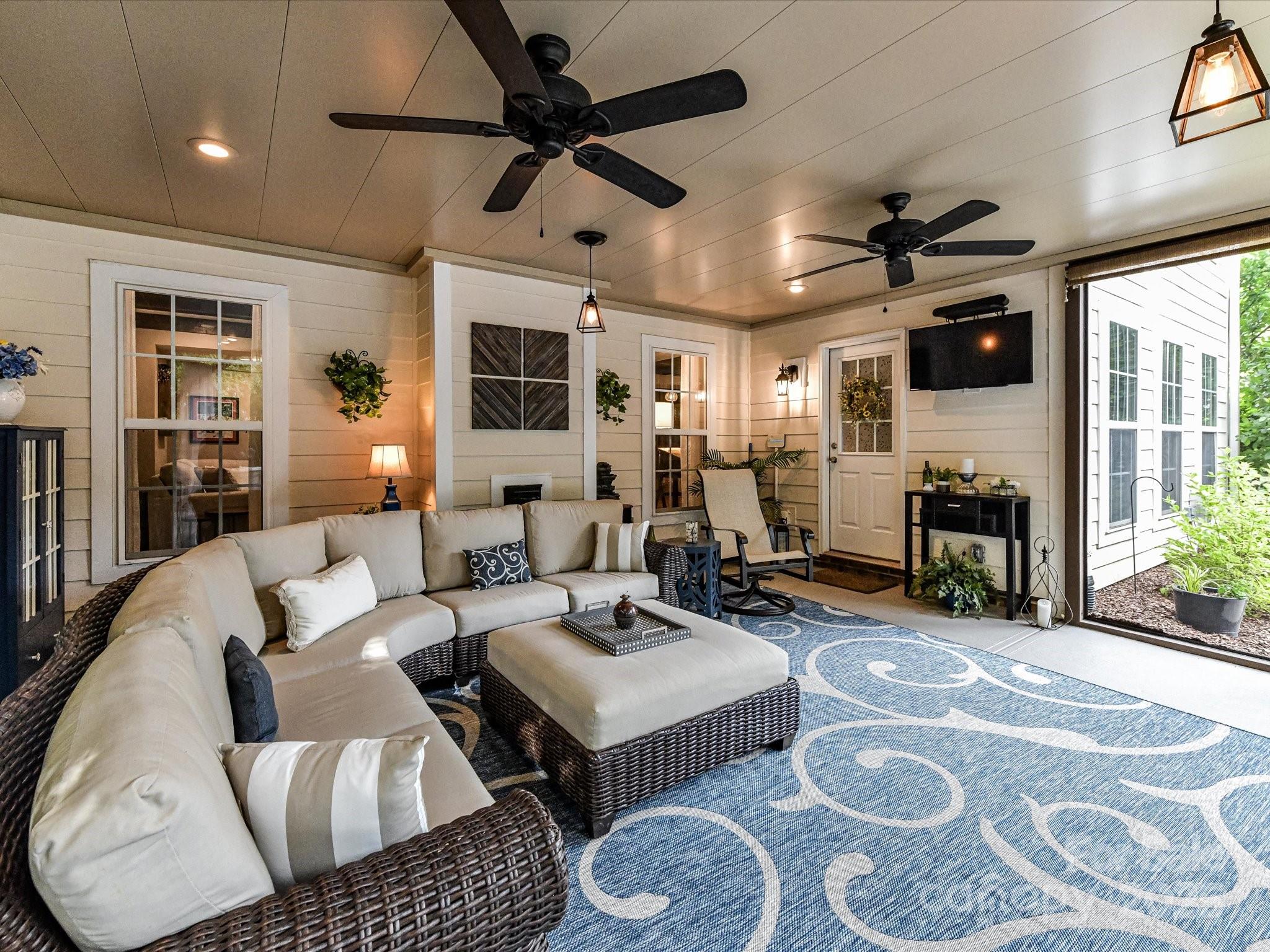 105 Beech Bluff Drive Mount Holly, NC 28120 - Photo 36 of 48 a living room with furniture and a flat screen tv