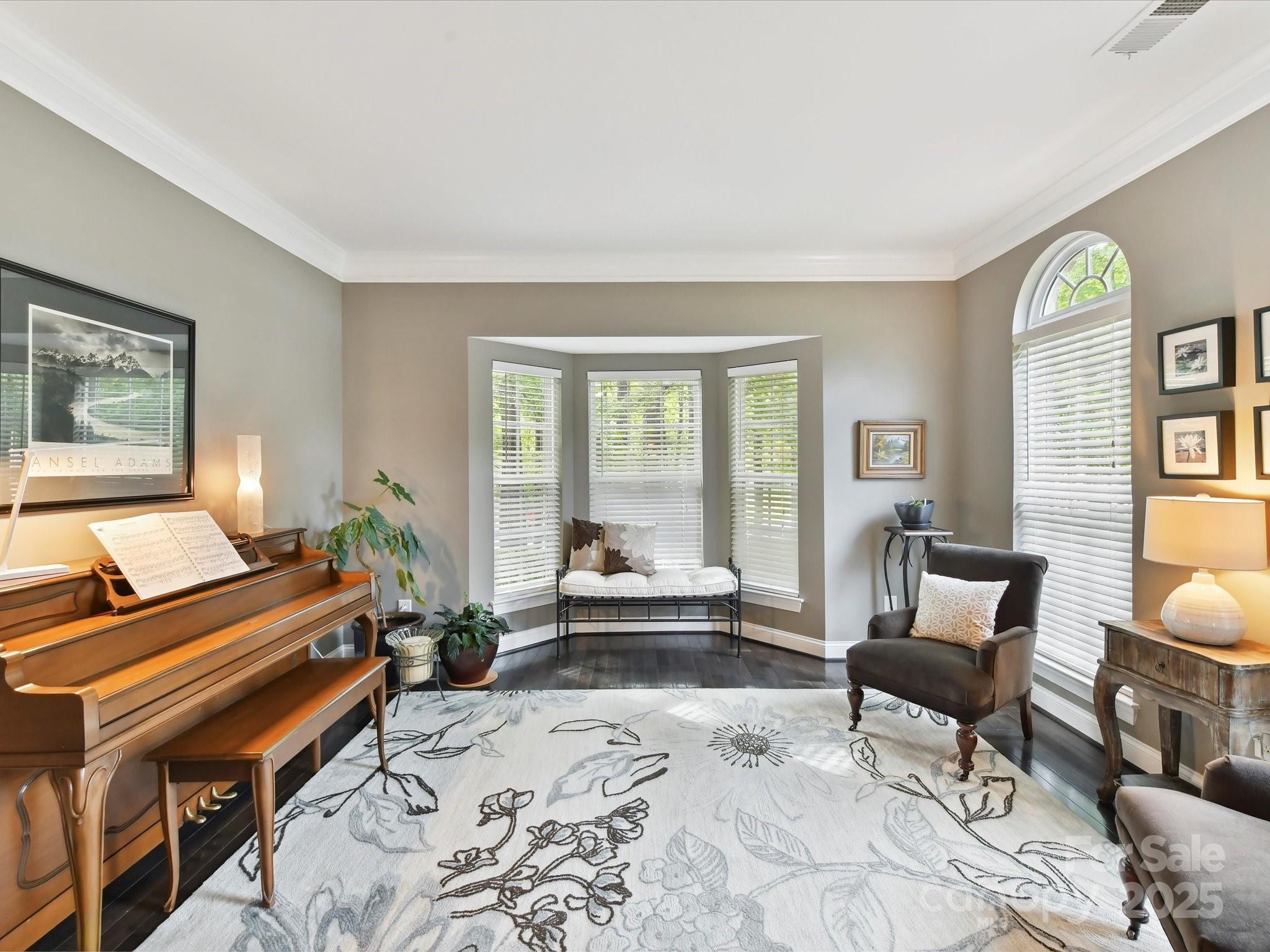 105 Beech Bluff Drive Mount Holly, NC 28120 - Photo 4 of 48 a bedroom with furniture and a window