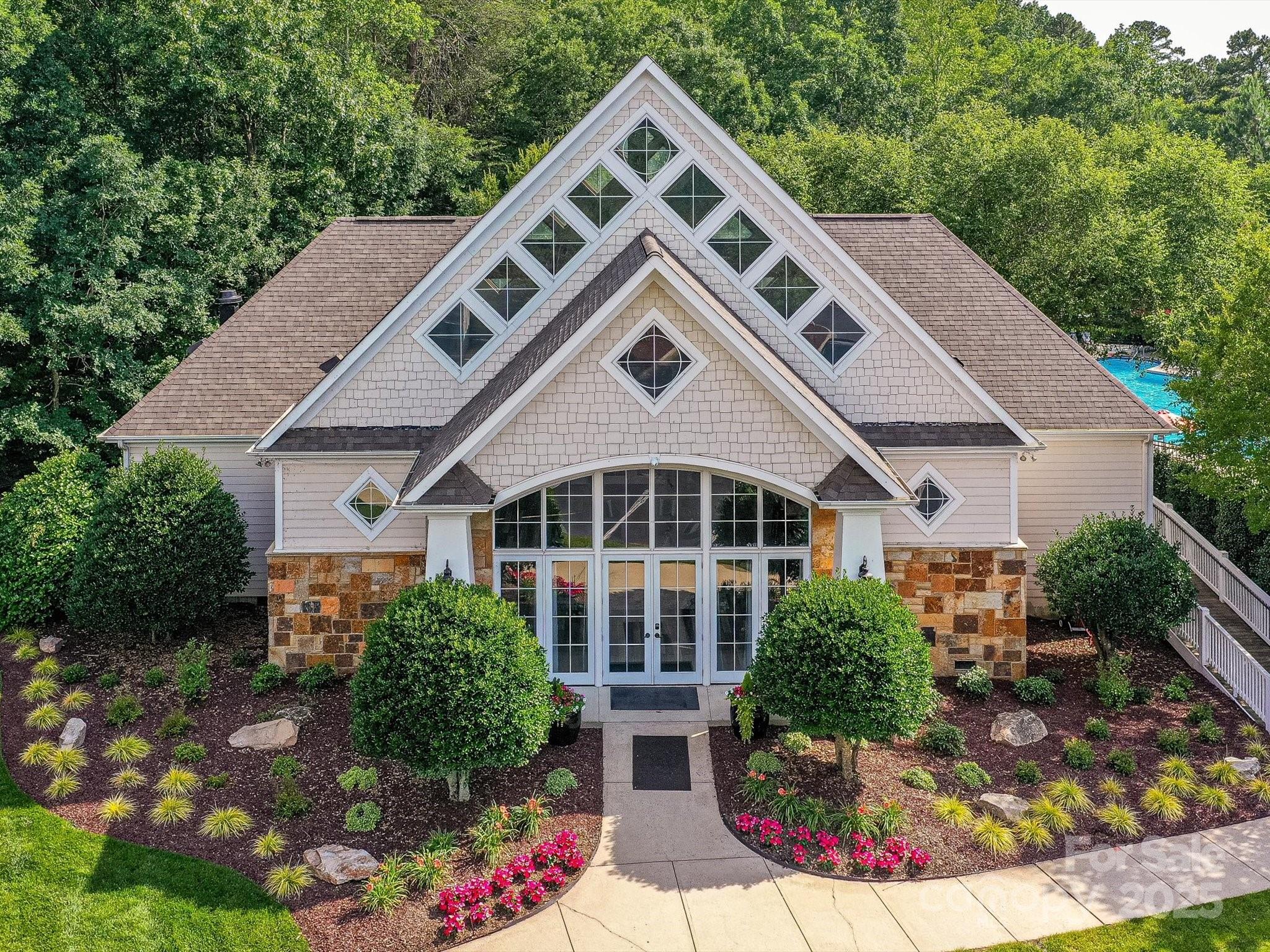 105 Beech Bluff Drive Mount Holly, NC 28120 - Photo 45 of 48 a front view of a house with a yard