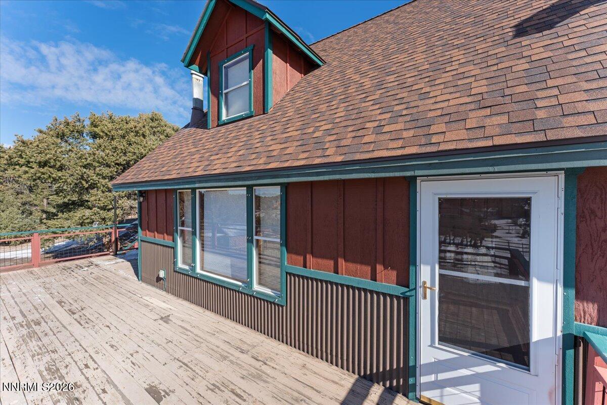 21381 Crestview Road Reno, NV 89521 - Photo 13 of 30 a view of a house with a balcony