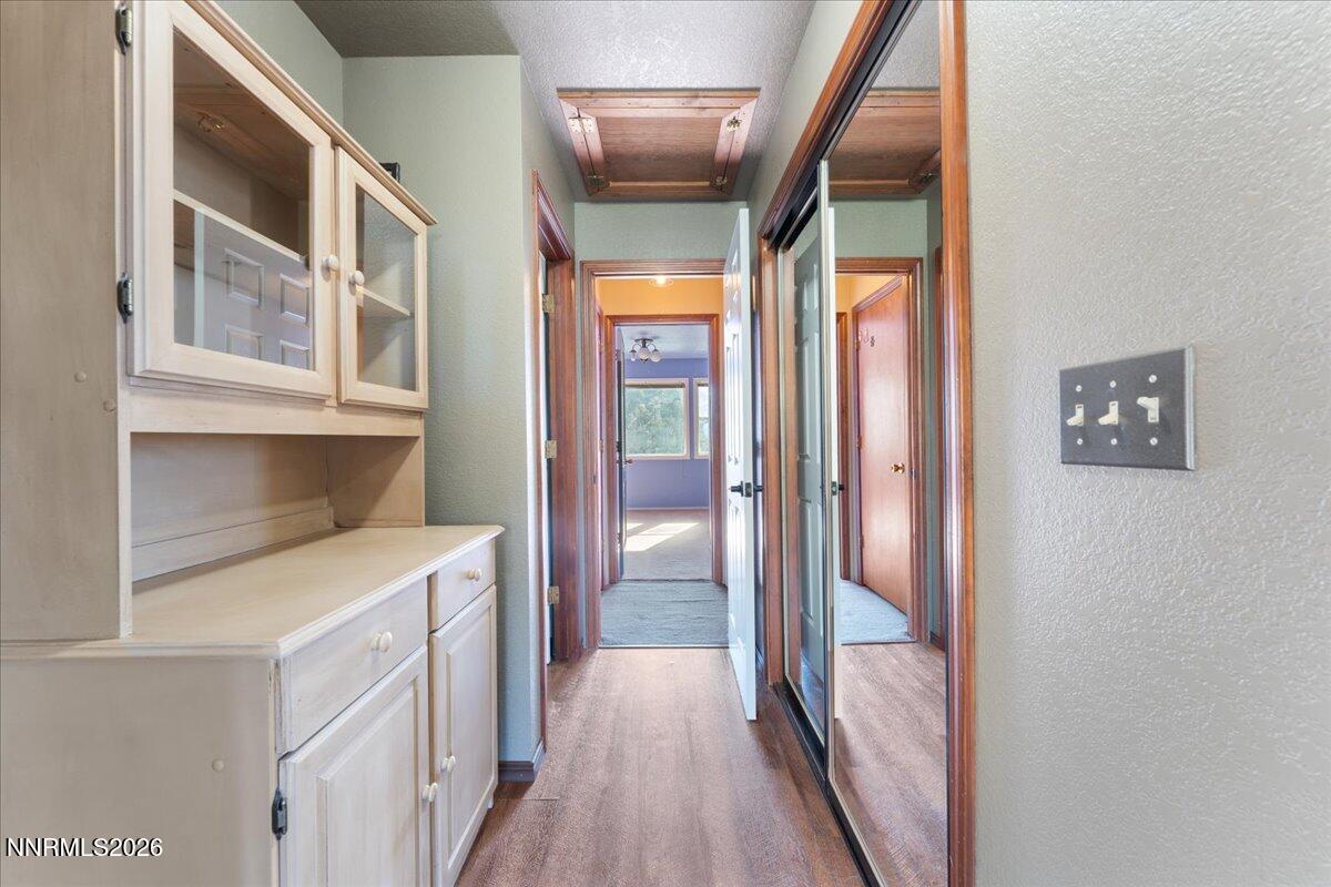 21381 Crestview Road Reno, NV 89521 - Photo 25 of 30 a view of hallway with washer and dryer