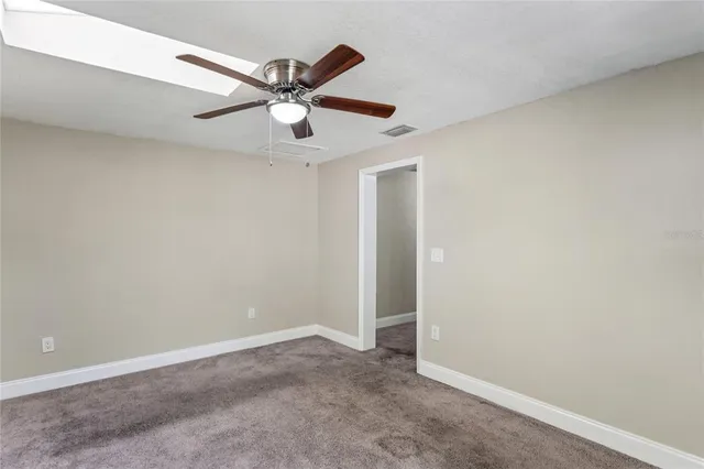 a view of front door with wooden floor