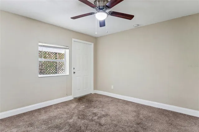 a bathroom with a granite countertop toilet sink and shower