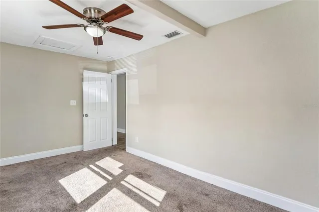 a view of a backyard of the house