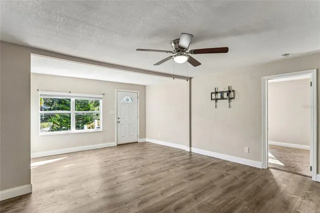 front view of house with potted plants