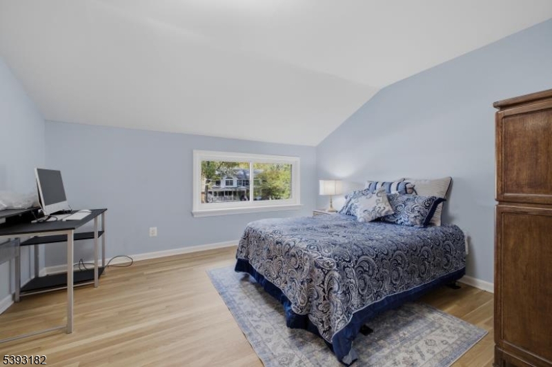 113 Barchester Way Westfield, NJ 07090 - Photo 20 of 40 a bedroom with a bed and a window