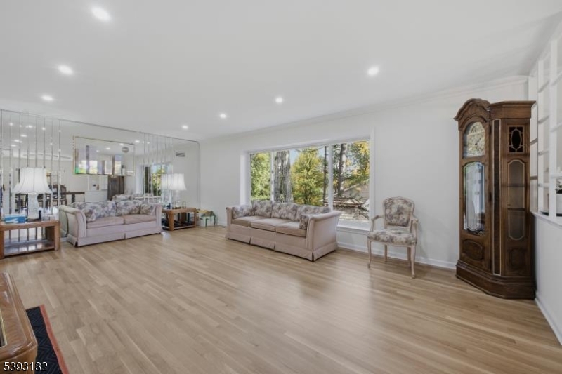 113 Barchester Way Westfield, NJ 07090 - Photo 6 of 40 a living room with furniture and a large window