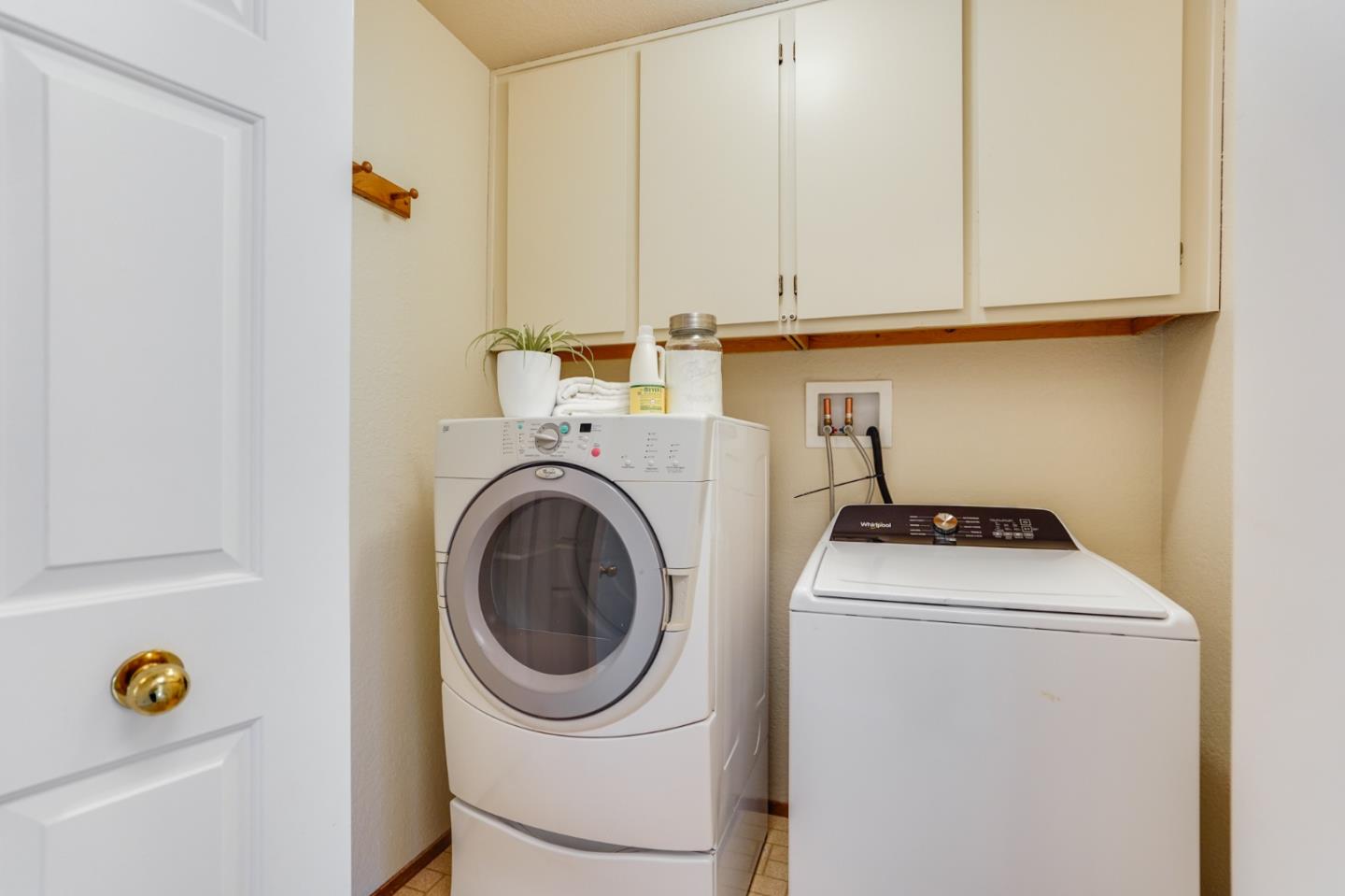 30 Bancroft Road Burlingame, CA 94010 - Photo 25 of 42 a utility room with dryer and washer