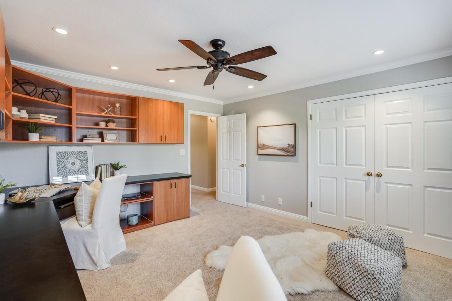 30 Bancroft Road Burlingame, CA 94010 - Photo 28 of 42 a bed room with a bed and a book shelf